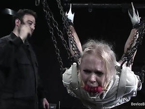 Blonde in straitjacket and gas mask gets humiliated