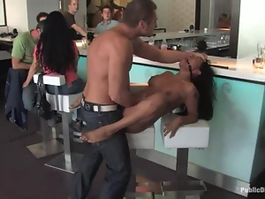 Gagged brunette chick rides a dick in some cafe