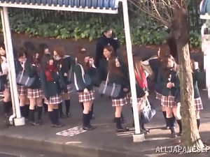 Japanese teen in uniform gets fucked in a school bus