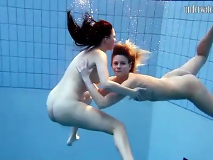 Young naked ladies in the pool are cute