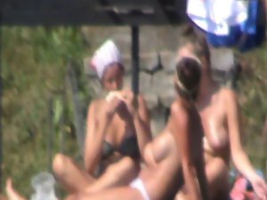 topless raunchy teen sunbathing