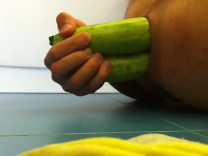 chap masturbating with vegetables and cums on herself