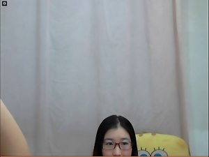 Chinese girlie demonstrates foot for webcam