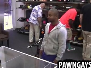 Naughty ebony hunk tries to sell a bike at the pawn shop