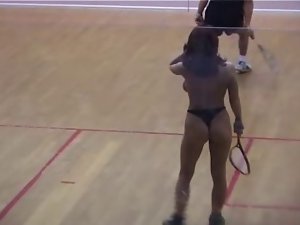 shameless girlie playing tennis nude in front of men crowd