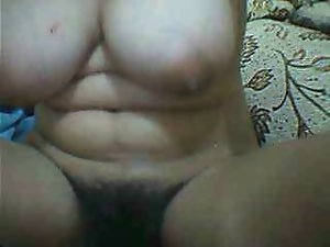 Asian Lassie show her hirsute snatch and mega big melons on webcam