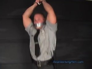 Muscular security guard bound and gagged